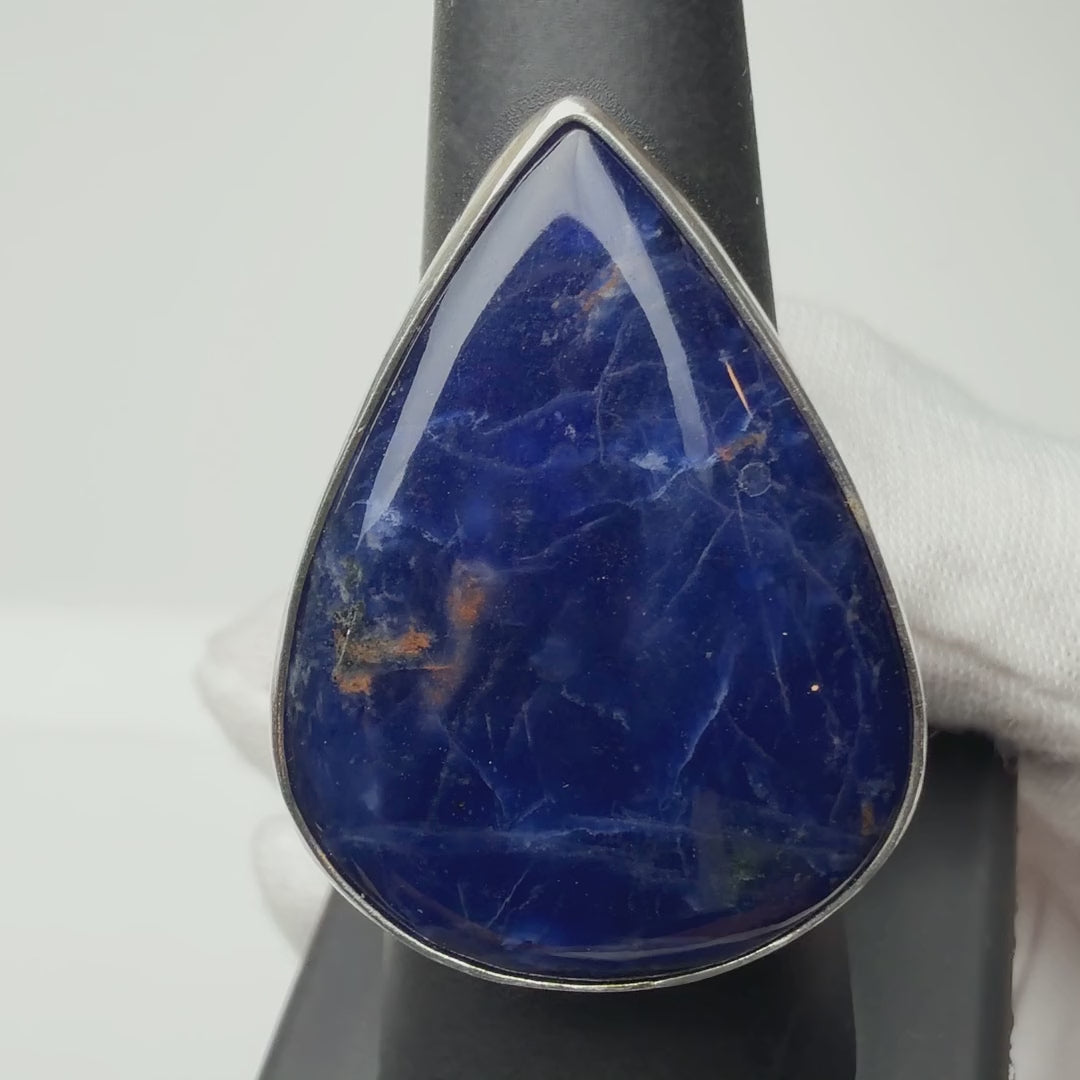 Sodalite ring turning on a ring display