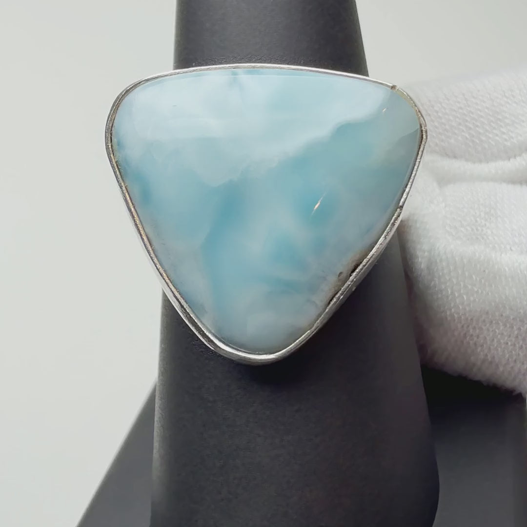 Larimar ring turning on a ring display
