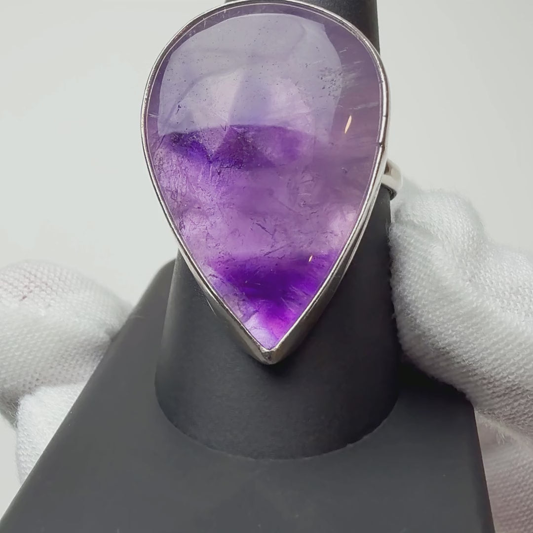 Amethyst ring turning on a ring display