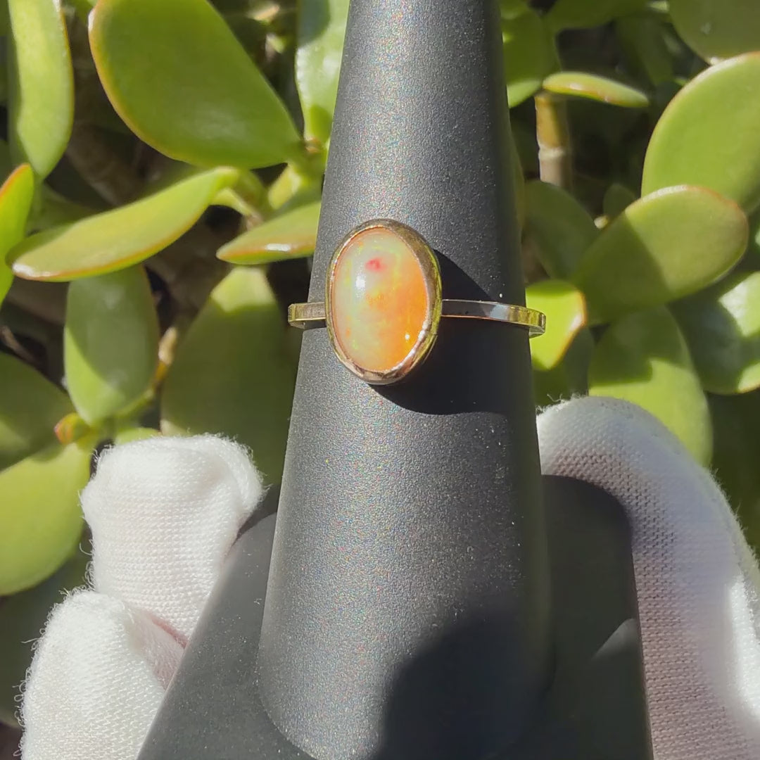 Opal ring turning on a ring display
