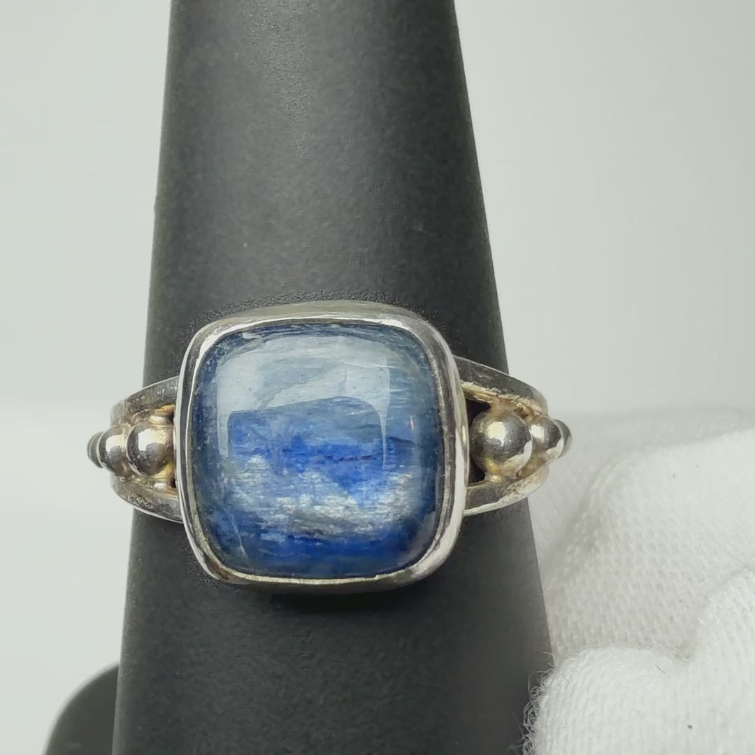 Kyanite ring turning on a ring display